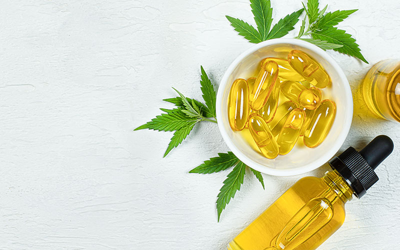 cbd oil and capsules in near proximity